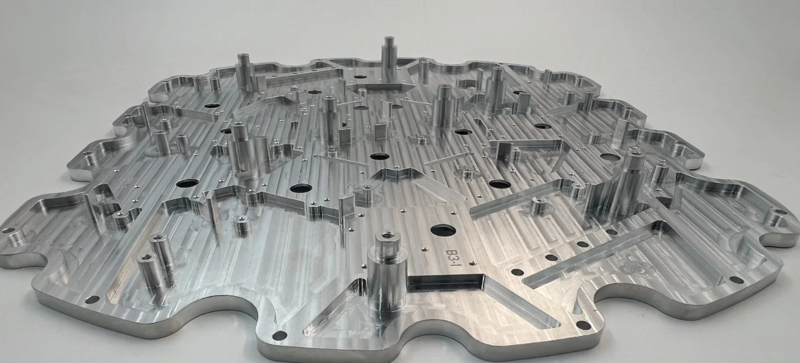 CNC machined metal part prepared for material and dimensional verification